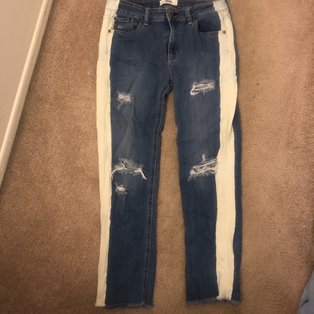 fitted jeans with white stripe. Mid/high rise